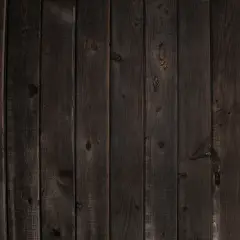 Planches de bois sombre, aspect vieilli, parfait pour noircir du bois et créer une ambiance rustique.