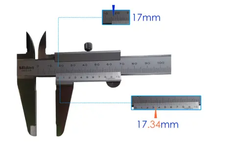 Apprenez comment lire un pied à coulisse avec cet exemple. La mesure principale est de 17mm, et la mesure vernier ajoute 0.34mm pour un total de 17.34mm.