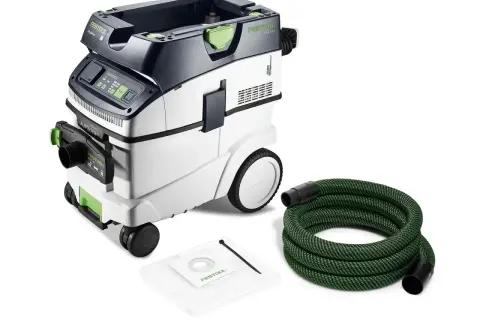 Aspirateur Festool CT VA 20 avec tuyau vert et sac filtrant. Idéal pour un atelier propre.